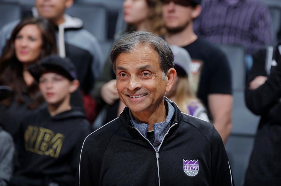 Vivek Ranadivé smiles during a Sacramento Kings game.