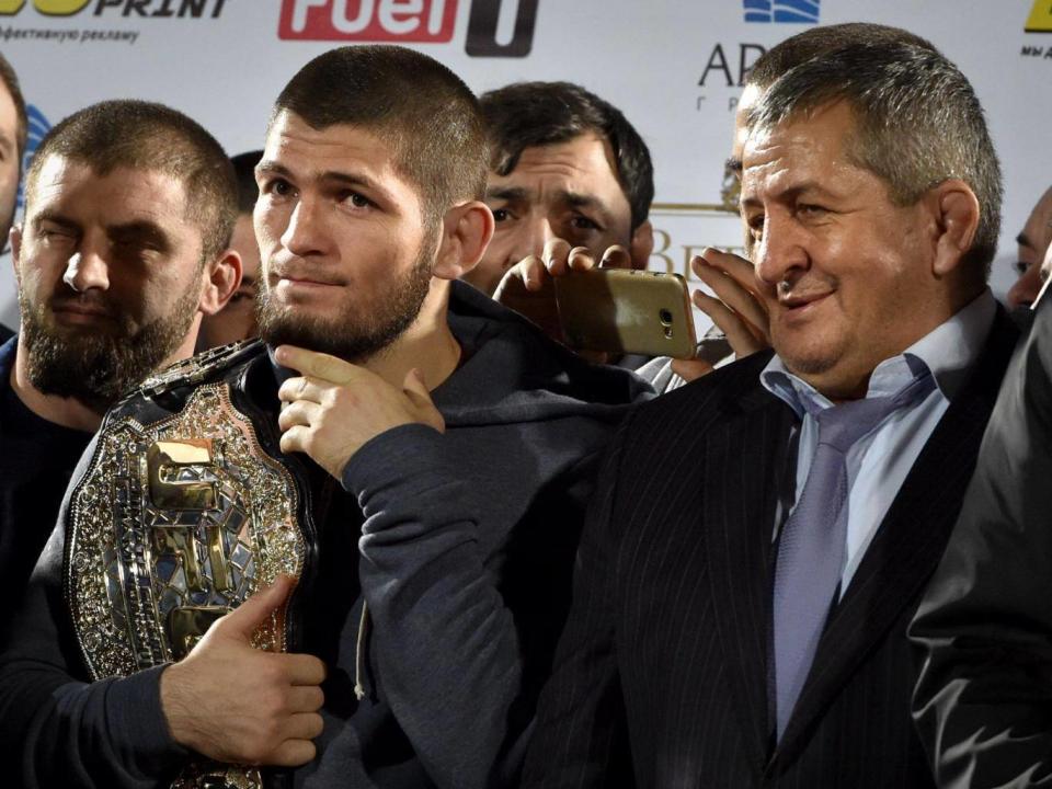 Abdulmanap Nurmagomedov (right) promised 'much stronger' punishment for his son (AFP/Getty)