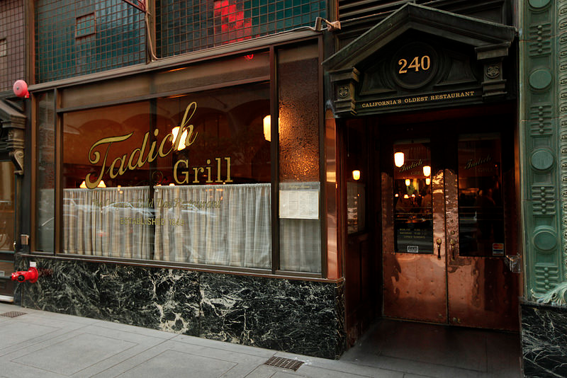 <p>The Art Deco vibe doesn't just remain on the outside of this <a href="https://www.tripadvisor.com/Restaurant_Review-g60713-d353920-Reviews-Tadich_Grill-San_Francisco_California.html" rel="nofollow noopener" target="_blank" data-ylk="slk:San Francisco restaurant;elm:context_link;itc:0;sec:content-canvas" class="link ">San Francisco restaurant</a>. Inside, the high ceilings, wood paneling, and majestic bar transport patrons back to 1849. They don't take reservations, but customers flock here for fresh seafood anyway.</p>