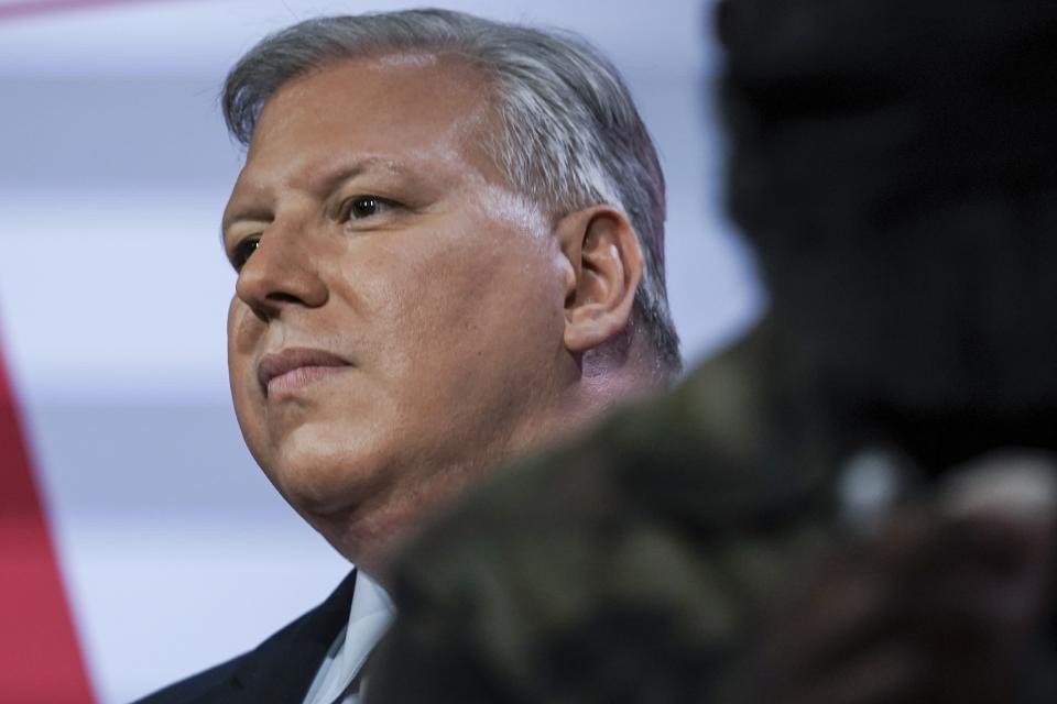 Businessman Harry Wilson listens as he prepares to participate in New York's Republican gubernatorial debate at the studios of CBS2 TV, Monday June 13, 2022, in New York. (AP Photo/Bebeto Matthews)