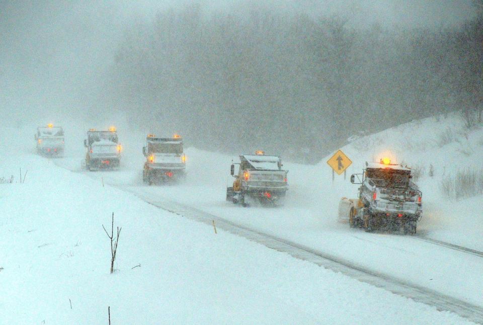 Snowplows attempt to clear Interstate 70 east during the record breaking snowstorm blanketing the Mid-Atlantic states on February 6, 2010.