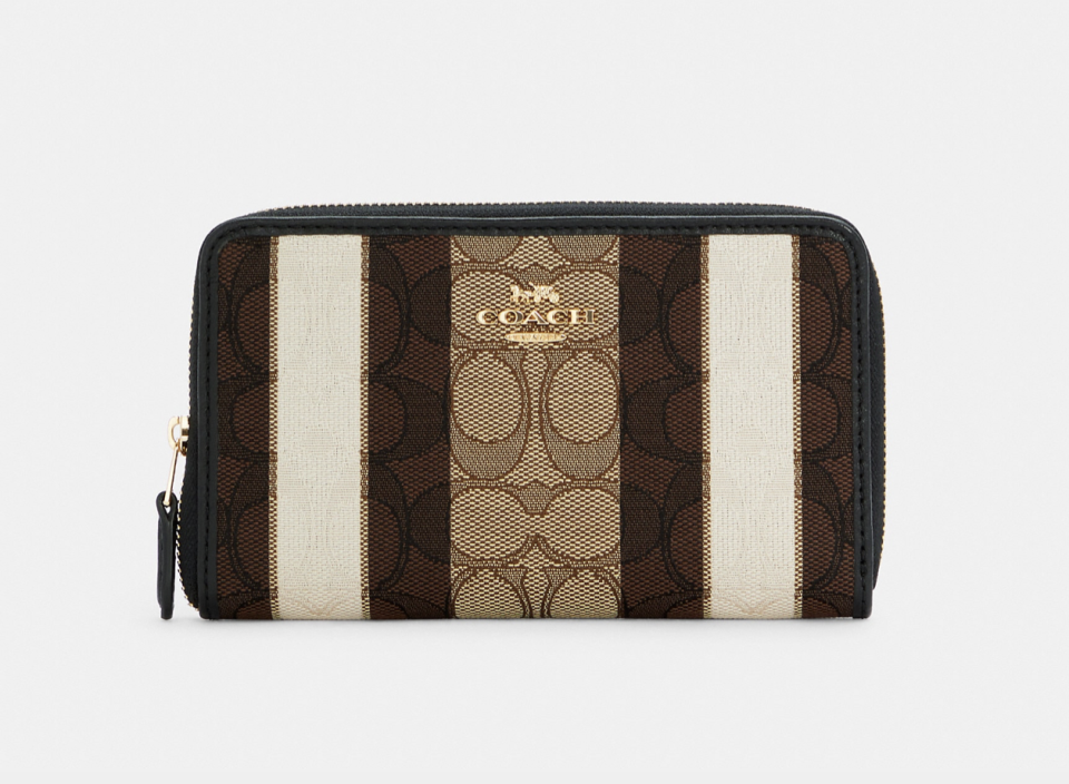 Coach Outlet Medium Id Zip Wallet In Signature Jacquard With Stripes Gold/Khaki Black Multi (Photo via Coach Outlet)