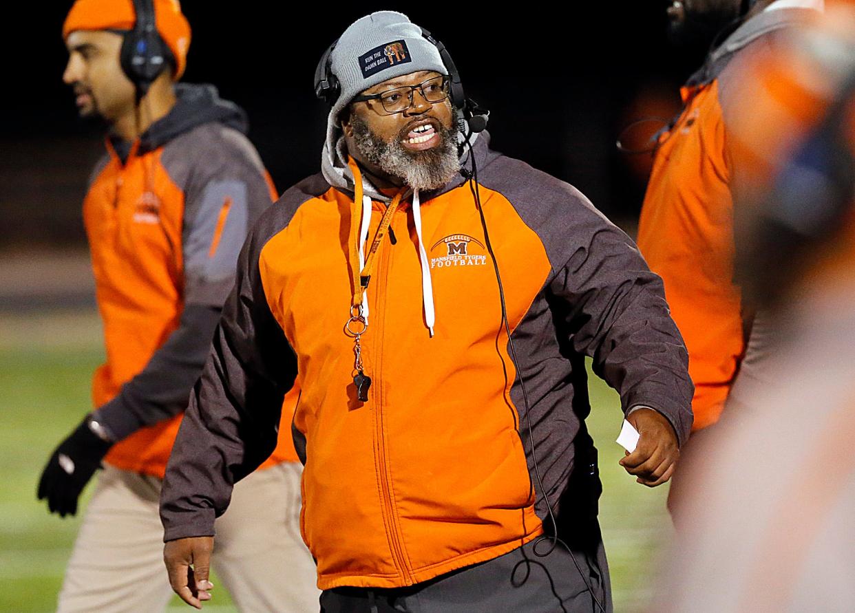 Mansfield Senior High School's head coach Chioke Bradley on the sideline against Toledo Central Catholic High School during their OHSAA Division III Region 10 high school football semifinal game action Friday, Nov. 10, 2023 at Bob Bishop Stadium in Clyde. TOM E. PUSKAR/MANSFIELD NEWS JOURNAL