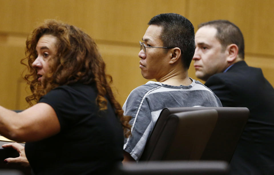 Johnathan A. Doody, awaits to be sentenced by Maricopa County Superior Court Joseph Kreamer on Friday, March 14, 2014 in Phoenix, Ariz. Doody, convicted of killing nine people, including six monks, during a robbery at a Buddhist temple in metro Phoenix was sentenced Friday to 249 years in prison. Doody was founded guilty in January of first-degree murder in the deaths of six monks, one nun and two helpers who were shot in the back of the head and were found arranged face-down in a circle in August 1991 at the Wat Promkunaram temple west of Phoenix. (AP Photo/The Arizona Republic, Rob Schumacher, Pool)