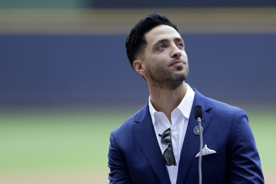 Former Milwaukee Brewers player Ryan Braun looks up to the crowd as he gives his retirement speech before a baseball game between the Brewers and the New York Mets, Sunday, Sept. 26, 2021, in Milwaukee. (AP Photo/Aaron Gash)