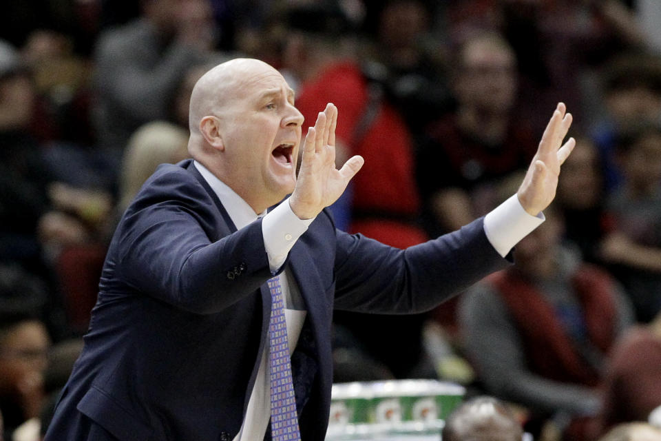 Chicago Bulls coach Jim Boylen calls his team during the first half of the team's NBA basketball game against the Phoenix Suns in Chicago, Saturday, Feb. 22, 2020. (AP Photo/Nam Y. Huh)