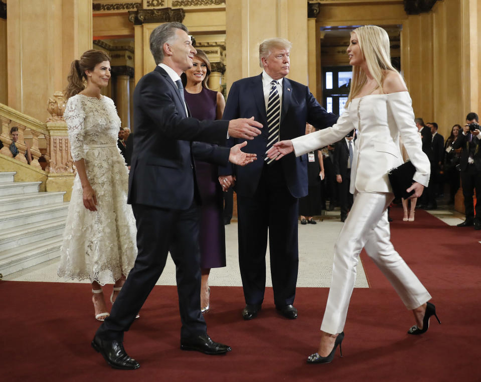 Argentina’s President Mauricio Macri greets Ivanka Trump, the daughter and assistant to President Donald Trump, far right, as Juliana Awada, Macri’s wife, first lady Melania Trump and President Donald Trump, looks on at the Teatro Colon for the G20 leaders dinner, Friday, Nov. 30, 2018 in Buenos Aires, Argentina. (Photo: Pablo Martinez Monsivais/AP)