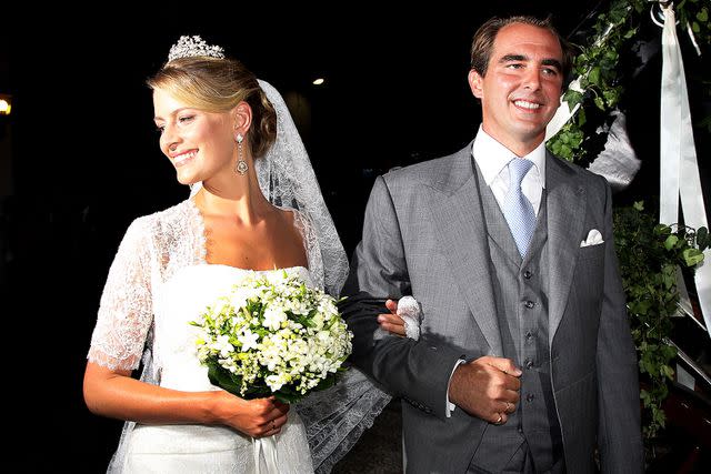 <p>Chris Jackson/Getty</p> Princess Tatiana and Princess Nikolaos of Greece at their wedding day on August 25, 2010.