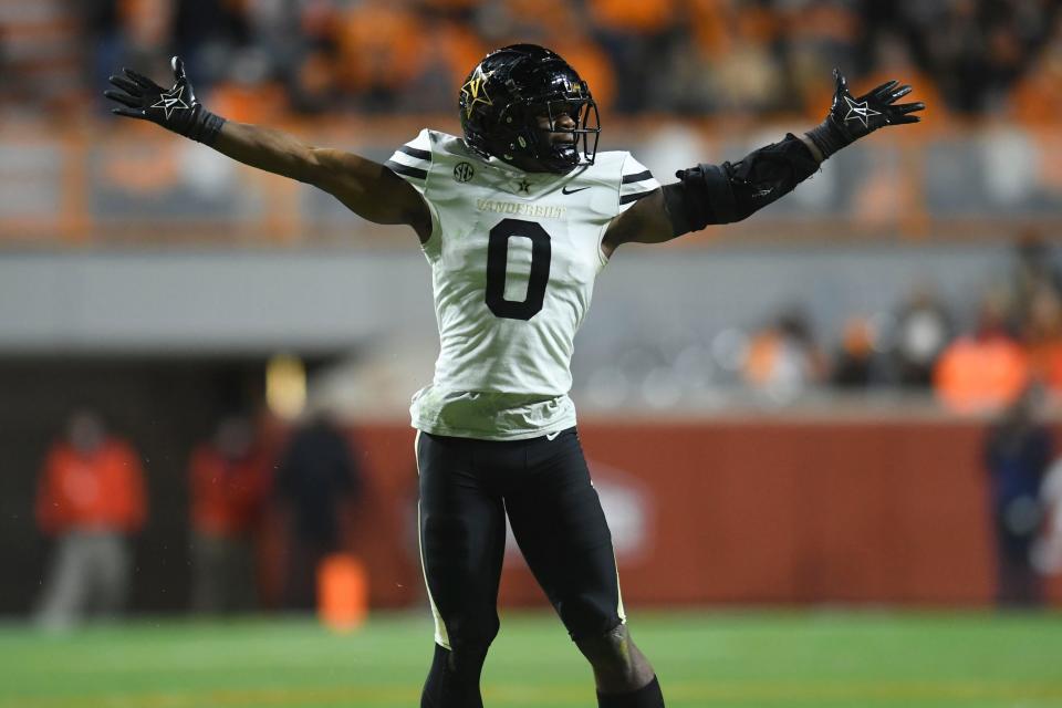 Vanderbilt linebacker Anfernee Orji (0) celebrates after sacking Tennessee quarterback Joe Milton III (7) in the NCAA college football game between the Tennesse Volunteers and Vanderbilt Commodores in Knoxville, Tenn. on Saturday, November 27, 2021. Kns Tennessee Vanderbilt Football