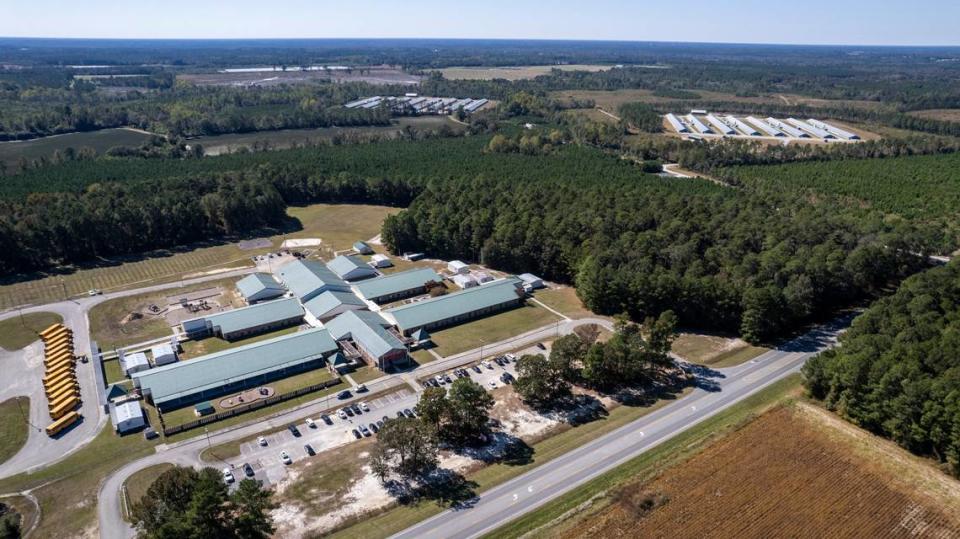 An aerial view of Union Elementary School in Clinton in Sampson County shows two poultry operations within a half-mile of the school.