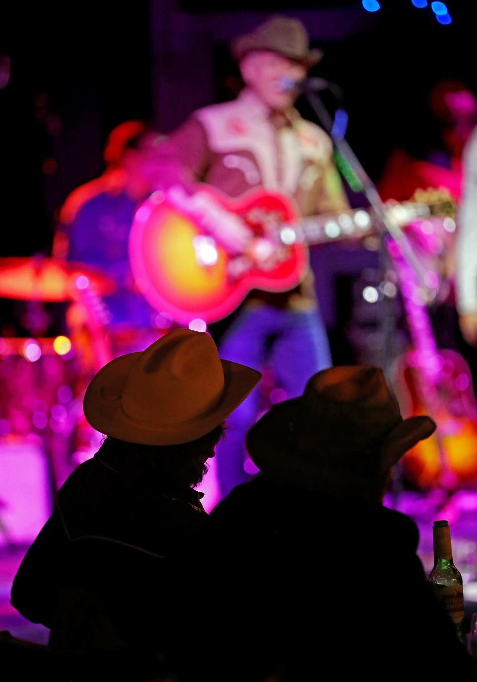 Country music fans watch The Shootouts perform Feb. 8 at Jilly's Music Room in downtown Akron.