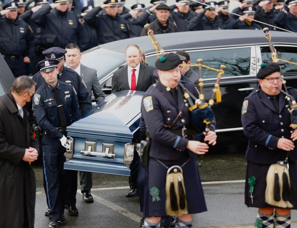 Boston police officer John O'Keefe, a Braintree native, was found dead outside a Canton home in the middle of a nor'easter on Jan. 29, 2022. His funeral was at St. Francis of Assisi Church in Braintree on Monday, Feb. 7, 2022.