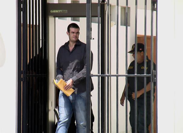 PHOTO: In this May 8, 2012, file photo, Dutch citizen Joran Van der Sloot walks handcuffed to a courtroom at the Piedras Gordas prison in Lima, Peru. (Jose Huaynate/Reuters, FILE)