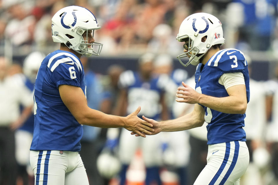 Indianapolis Colts place kicker Rodrigo Blankenship (3) celebrates a find goal with teammat punter Matt Haack (6) during the second half of an NFL football game Sunday, Sept. 11, 2022, in Houston. (AP Photo/Eric Christian Smith)