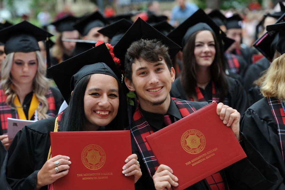 Ezzie Baltierra-Chavez of Denver and Dominique Barahona of Coral Springs, Florida, were among the members of the Monmouth College Class of 2022 who graduated Sunday afternoon on the College's Wallace Hall Plaza.