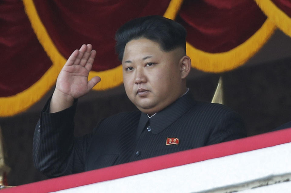 FILE - In this Oct. 25, 2015, file photo, North Korean leader Kim Jong Un gestures as he watches a military parade during celebrations to mark the 70th anniversary of North Korea's Workers' Party in Pyongyang, North Korea. For months, North Korea has been relatively uncombative, as Kim grapples with the coronavirus pandemic, a string of natural disasters and the deepening economic pain from years of tough U.S.-led sanctions. (AP Photo/Wong Maye-E, File)