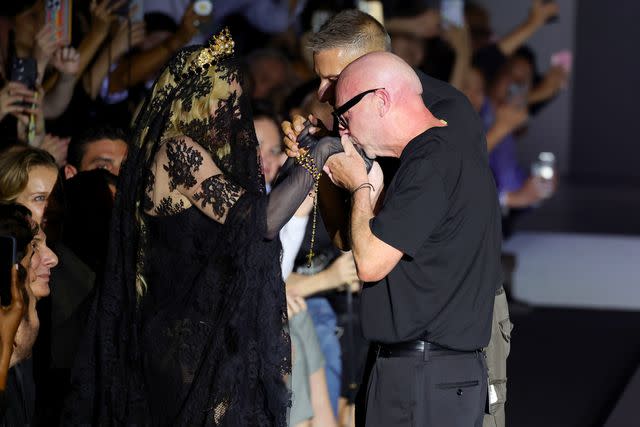 <p>Andreas Rentz/Getty </p> Madonna, Domenico Dolce and Stefano Gabbana on Sept. 21, 2024