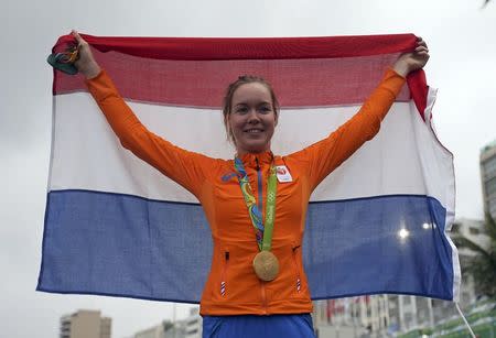 2016 Rio Olympics - Cycling Road - Final - Women's Road Race - Fort Copacabana - Rio de Janeiro, Brazil - 07/08/2016. Anna van der Breggen (NED) of Netherlands celebrates winning the women's road race. REUTERS/Matthew Childs