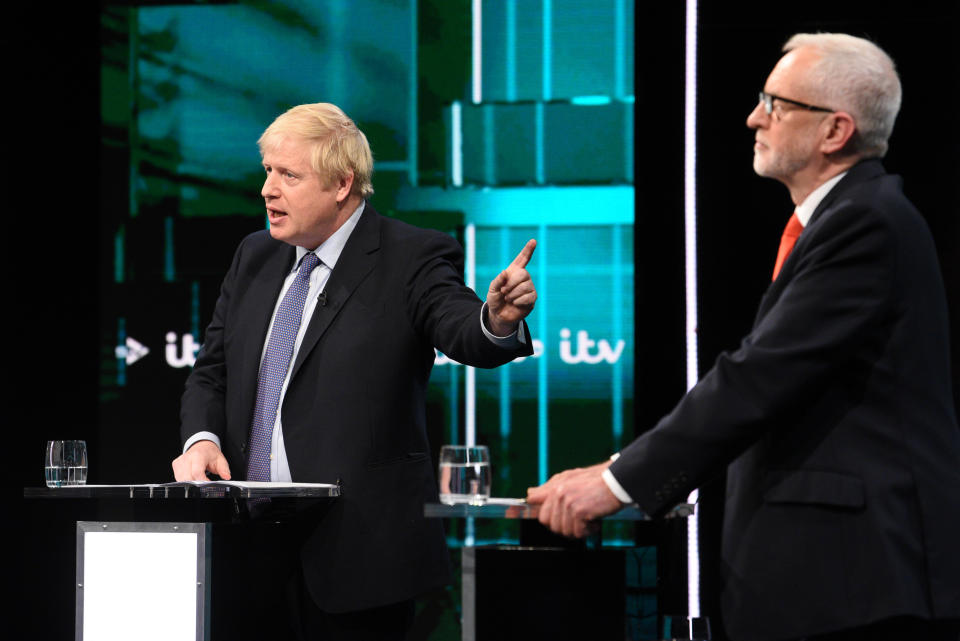 SALFORD, ENGLAND - NOVEMBER 19: (AVAILABLE FOR EDITORIAL USE UNTIL DECEMBER 19, 2019) In this handout image supplied by ITV, Prime Minister Boris Johnson and Leader of the Labour Party Jeremy Corbyn answer questions during the ITV Leaders Debate at Media Centre on November 19, 2019 in Salford, England. This evening ITV hosted the first televised head-to-head Leader’s debate of this election campaign. Leader of the Labour party, Jeremy Corbyn faced Conservative party leader, Boris Johnson after the SNP and Liberal Democrats lost a court battle to be included. (Photo by Jonathan Hordle//ITV via Getty Images)
