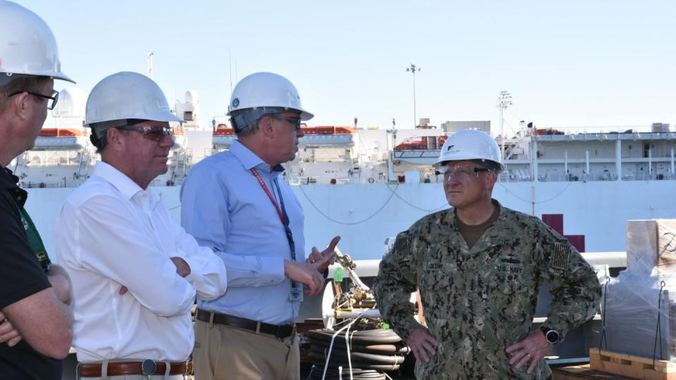Chief of Naval Operations Adm. Mike Gilday, right, speaks with a NASSCO official during a visit to the yard on Feb. 18, 2022. (Cmdr. Courtney Hillson/U.S. Navy)
