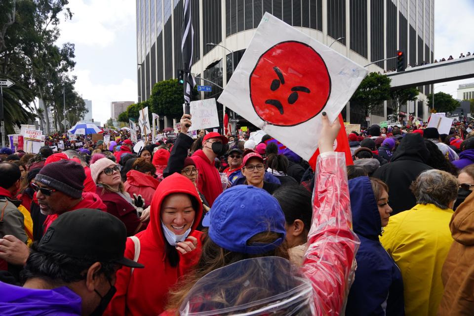 Striking employees of the Los Angeles Unified School District participate in a rally in downtown Los Angeles. Custodians, cafeteria employees, campus security, teaching assistants and educators from planned protests from March 21 to 23, in search of better wages and benefits.