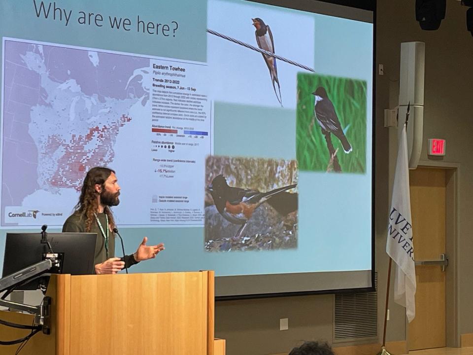 Charles Clarkson, director of avian research for the Audubon Society of Rhode Island, speaks at symposium on birds in New England.