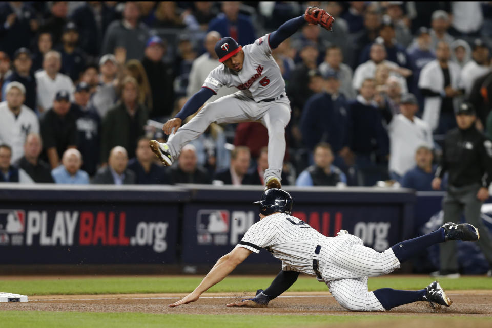 The Yankees-Twins wild-card game was truly wild, and people tuned in to watch the action. (AP Photo)