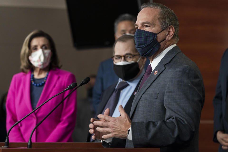 Rep. David Cicilline, D-R.I., right, with Senate House Speaker Nancy Pelosi of Calif., left, and Sen. Jerry Nadler, D-N.Y., speaks about the Congress Equality Act, Thursday, Feb. 25, 2021, on Capitol Hill in Washington. Rep. Mark Takano, D-Calif., is behind Nadler. (AP Photo/Jacquelyn Martin)