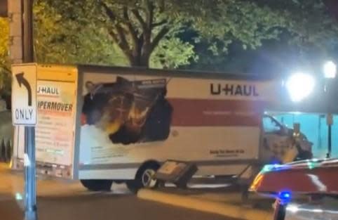 A U-Haul truck is seen after crashing into security barriers around Lafayette Park across from the White House late on May 22, 2023. / Credit: Chris Zaboji via Storyful