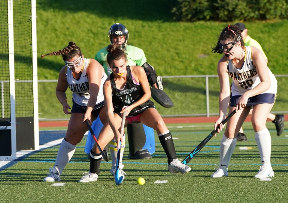 Yorktown's Sammy Robustelli (14) works the ball during their 1-0 win over Panas in field hockey action at Walter Panas High School in Cortlandt on Thursday, September 21, 2023.