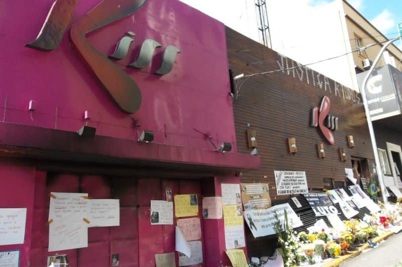 Mourners leave flowers and notes outside the Kiss nightclub in Santa Maria, Brazil, on February 4, 2013. The club caught on fire January 27, 2013, killing more than 230 people. File Photo by Leandro/LV/Wikimedia