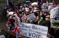 Anti-government protesters gather at British Consulate General in Hong Kong