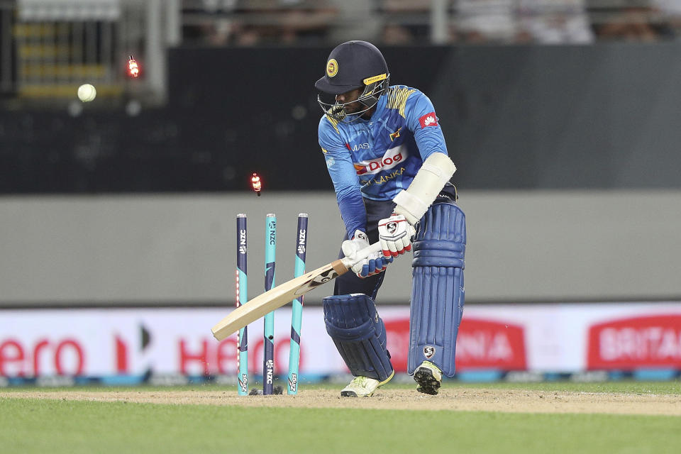 Sri Lanka's Dhananjaya de Silva is bowled out by New Zealand's Lockie Ferguson for 10 runs during their twenty/20 cricket international at Eden Park in Auckland, New Zealand, Friday, Jan. 11, 2019. (AP Photo/David Rowland)