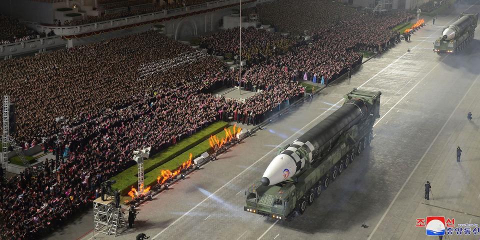 Crowds watch as vehicles parade what North Korea claims is the Hwasong-17 nuclear ICBM on April 25, 2022. Image provided by state media