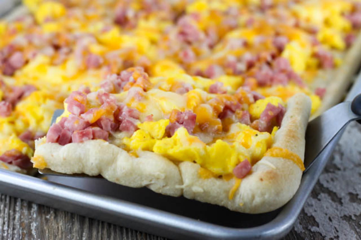 <p>A protein-packed pizza for breakfast? Yes, please!</p><p><strong>Get the recipe: <a href="https://www.farmwifecooks.com/easy-ham-and-cheese-breakfast-pizza/" rel="nofollow noopener" target="_blank" data-ylk="slk:Ham and Cheese Breakfast Pizza;elm:context_link;itc:0;sec:content-canvas" class="link rapid-noclick-resp">Ham and Cheese Breakfast Pizza</a></strong></p>