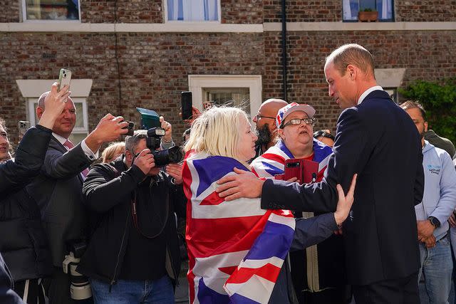 <p>Ian Forsyth/Getty Images</p> Prince William speaks with well-wishers after visiting James' Place Newcastle on April 30, 2024 in Newcastle-Upon-Tyne, England.