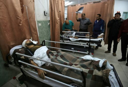 Wounded Palestinians receive treatment in Najjar hospital in Rafah after Israel conducted some 20 air strikes on the Gaza Strip on October 17, 2018