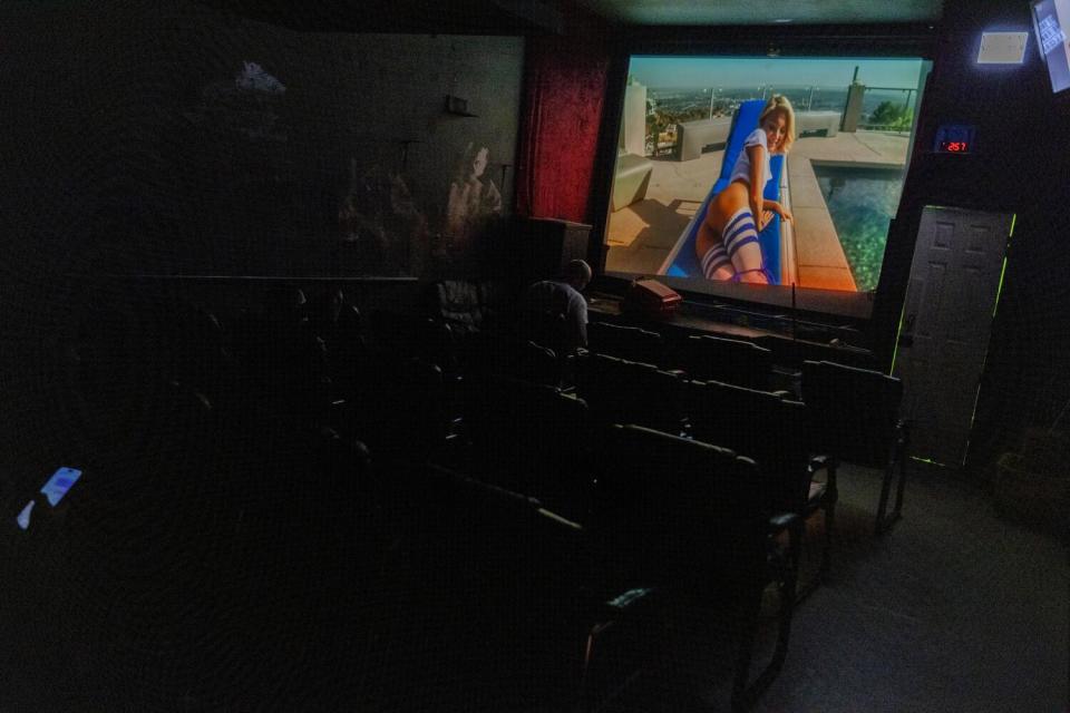 An adult film on the screen inside the Tiki Theater on Santa Monica Boulevard.