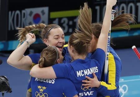 Curling - Pyeongchang 2018 Winter Olympics - Women's Final - Sweden v South Korea - Gangneung Curling Center - Gangneung, South Korea - February 25, 2018 - Team Sweden celebrate their win. REUTERS/Cathal McNaughton