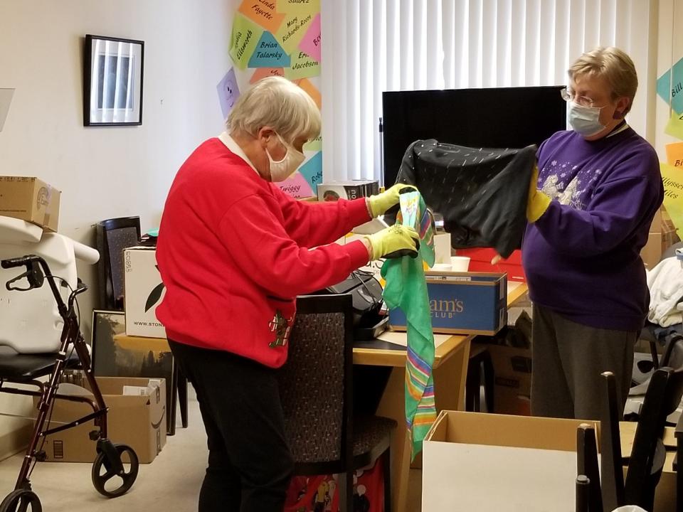 Volunteers at the Cathedral City Senior Center sort donations.