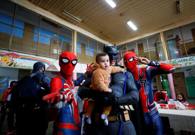 Argentine superheroes cheer up the children of prison inmates
