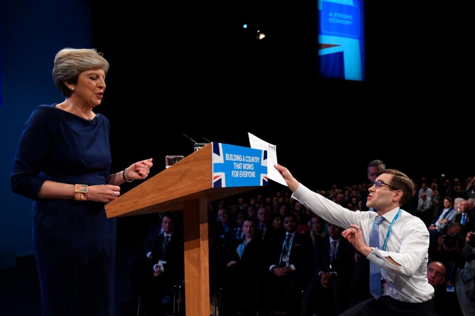 Handing Theresa May a P45 at the 2017 Conservative Party conference (AFP/Getty)