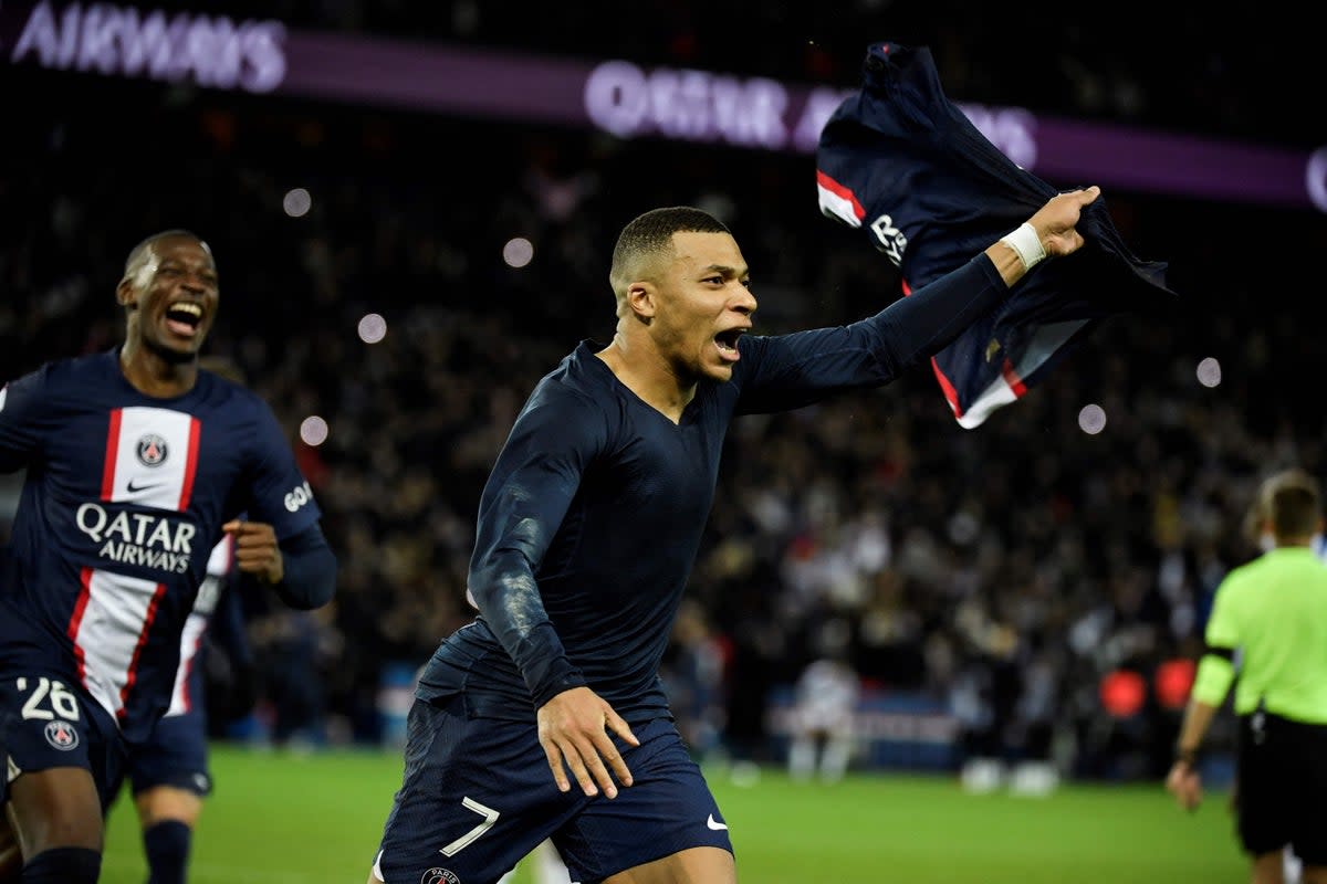 Kylian Mbappe celebrates scoring PSG’s late winner from the spot (AFP via Getty Images)