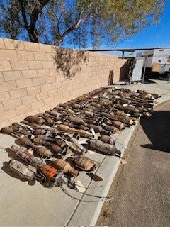 A Victorville couple was arrested after sheriff’s investigators discovered stolen vehicles and over 100 catalytic converters in their possession.