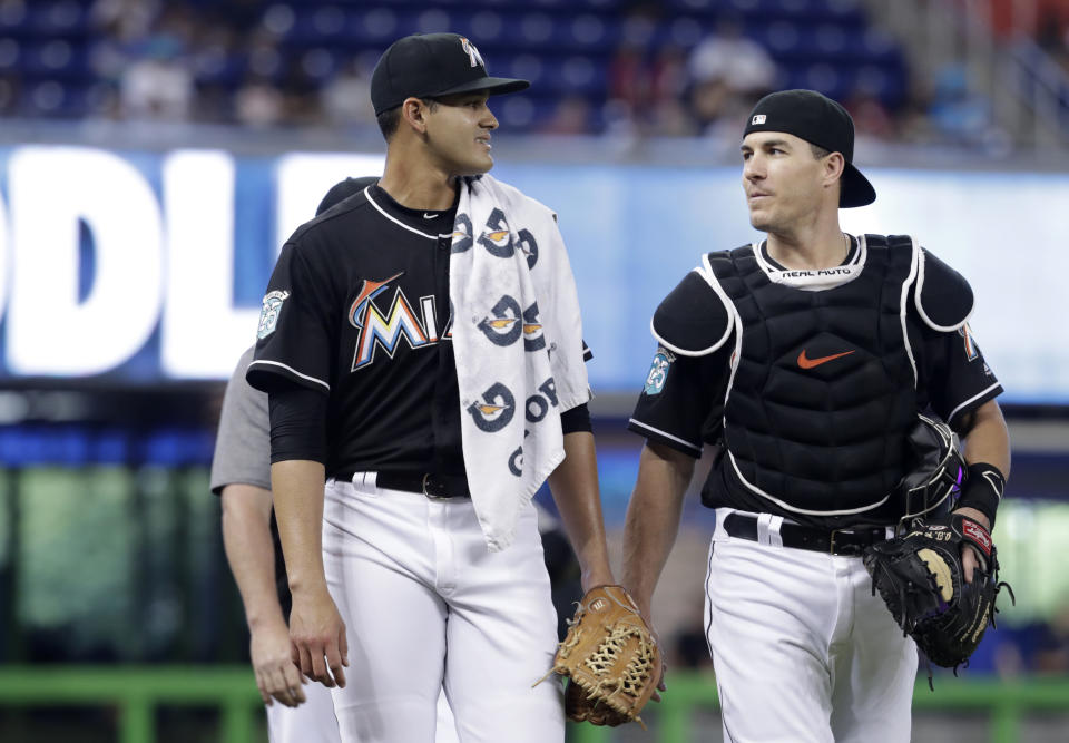 Miami Marlins starting pitcher Pablo Lopez, left, walks with catcher J.T. Realmuto (AP Photo/Lynne Sladky)