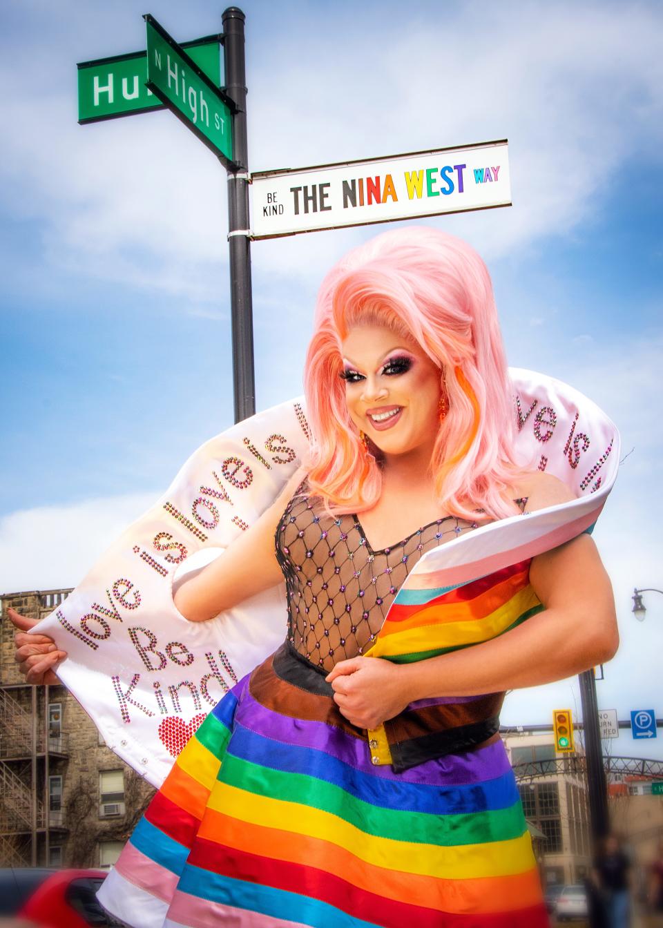 Nina West, a Columbus native and LGBTQ advocate, stands at the intersection of North High Street and Hull Alley — renamed Nina West Way in 2019.