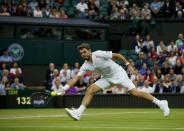 Britain Tennis - Wimbledon - All England Lawn Tennis & Croquet Club, Wimbledon, England - 1/7/16 Switzerland's Stan Wawrinka in action against Argentina's Juan Martin Del Potro REUTERS/Paul Childs