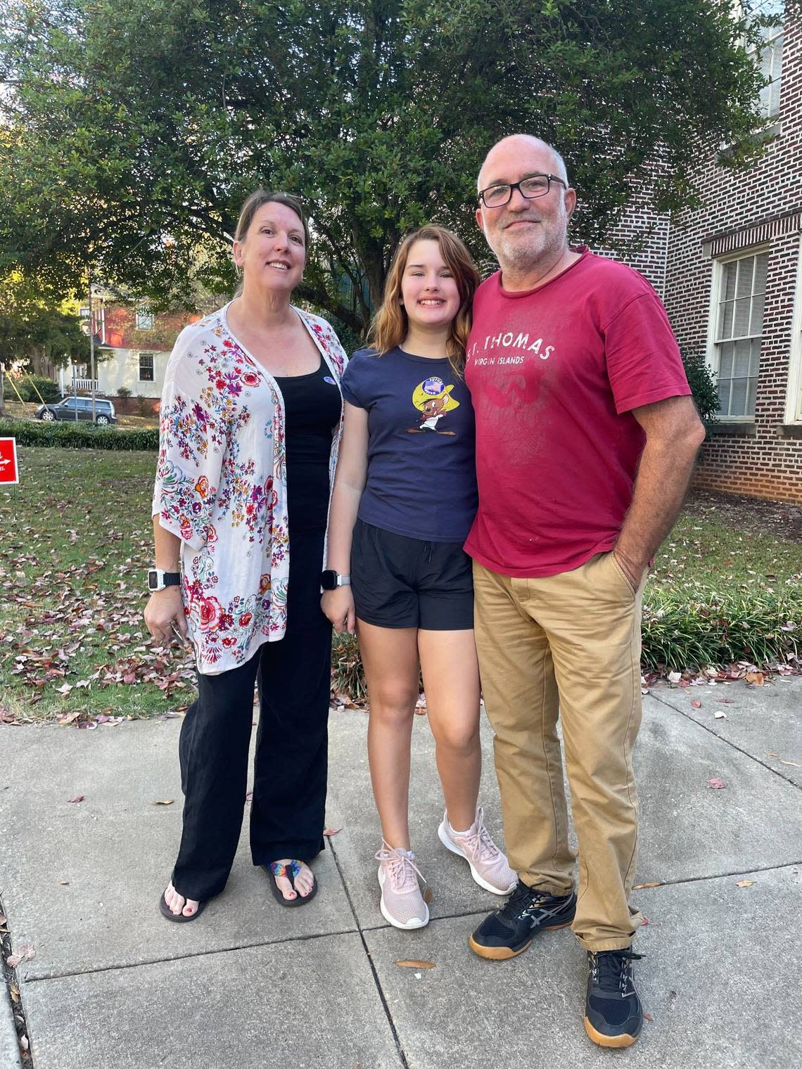 Angela and Kent Kilpatrick took their daughter Jules along to the polls at Project Enlightenment School in Raleigh on Nov. 8, 2022.