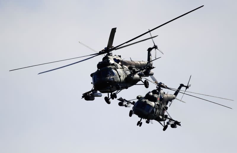 FILE PHOTO: Belarusian military helicopters fly during the Zapad 2017 war games near the village of Volka