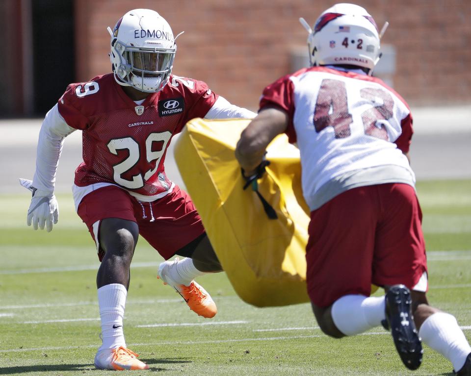 Arizona Cardinals’ fourth-round draft pick Chase Edmonds (L) paid off his sister’s student loans, fulfilling a long-held goal. (AP)